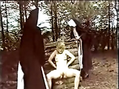 2 nuns chastise and manhandle a juvenile beauty