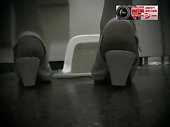 Girls peeing in the common rest room voyeur spy cam video