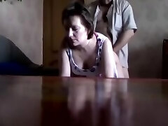 Hidden cam showing a Russian unfaithful wife fucked doggystile by her paramour.