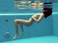 Warm alone Lady Dee flashes her tits and nice bum underwater