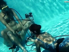 Diving tutor fucks adorable babe in scuba Lizzy under the water