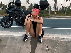Motorbike girlfriend pissing on the roadside