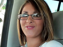 Seductive blonde chick wearing glasses leads dirty talks in the camper