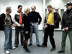 Mature blonde in stockings is penetrated in all holes