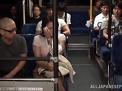 Two Guys Fucking a Huge-titted Japanese Gal's Big Boobs in the Public Bus