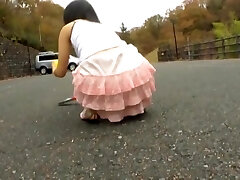 Asian teen bends over and flashes crazy upskirt in the street