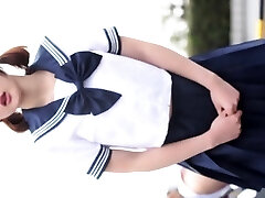 Sexy Japanese chick in a student outfit loves to tease the Sexy Japanese chick in a student outfit loves to tease the