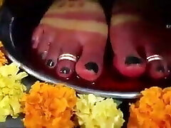 Indian mistress has her feet worshipped by victim