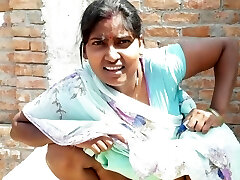 Beautiful Indian bhabhi pissing on her house roof and fingering her cremei cock-squeezing pussy