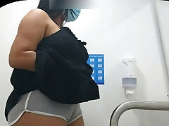 CAMERA Grasping CAMELTOE OF GIRL WITH BIG Caboose IN PUBLIC BATHROOM