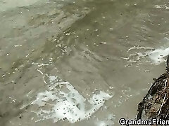 Aged bitch takes two cocks outdoors Aged bitch takes two cocks outdoors