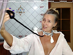 Super-hot hostess Lukerya in the kitchen in a dressing gown.