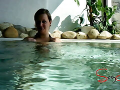 MILF gives fellatio in a public spa