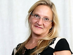 American cougar Mary Wana unclothes off and plays at the office American cougar Mary Wana unclothes off and plays at the office