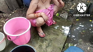 Indian house wifey bathing outside