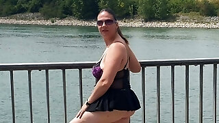 the biggest biotch in Alsace shows her donk in the street in public in front of passers-by