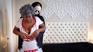 Mature ebony in a nurse uniform gets screwed by a Bbc in mask