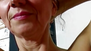 Old but horny German lady dildoing her hairless twat