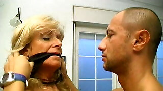 Two dudes fuck a mature blondie on couch after getting double blowjobs