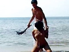 Handsome bigcocked man schools, lashes and fucks hot chick on a beautiful ocean beach