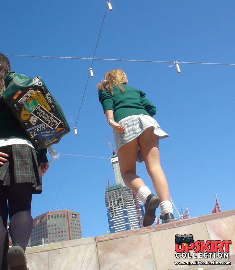 Schoolgirl upskirt - legal teen in green skirt spyed