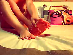 Massaging my feet after a hard day at work