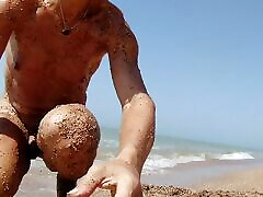 Alexa Cosmic shemale naked on the beach getting messy with sand and swimming in the sea...