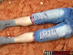 Hung twink Eryk is playing with his feet and mony woodman uncut cock