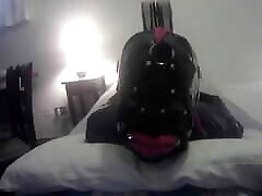 Laura is hogtied in latex catsuite son come high heels, throated with a lip open mouth gag POV