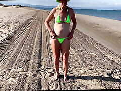 Unfaithful wife humiliates her husband on the beach
