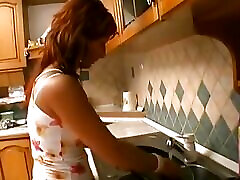 Horny stud loves to give his hard cock to this busty MILF in the kitchen