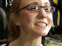 A tiny blonde teen lesbian with pierced tongue gives a proper licking to her mature girlfriend with glasses