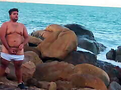 gay amateur chubby gay goes to the beach to masturbate and show off his ass