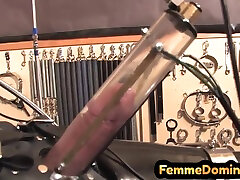 Latex BDSM femdom drains man and toy cock with milking machine