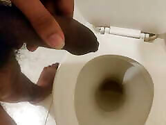 Indian black dick men peeing in the toilet