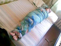 first time public money girl mummified in a bedsheet