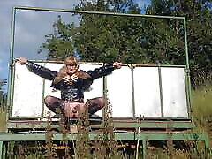 Crossdresser Playing Down on the Farm in PVC Crossdresser Playing Down on the Farm in PVC
