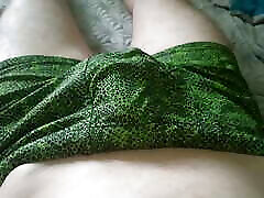 A guy in beautiful green swimming trunks jerks off his soft cock with his fingers A guy in beautiful green swimming trunks jerks off his soft cock with his fingers
