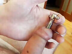 Penis tuner hollow screw urethral plug insertion and a cumshot through Penis tuner hollow screw urethral plug insertion and a cumshot through