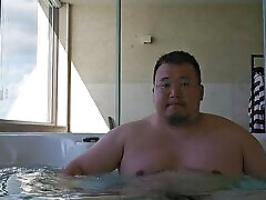 Asian Chubby rubbing his tits Asian Chubby rubbing his tits