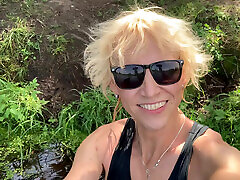 Trans girl Alexa Cosmic swimming and playing in the lake wearing black short and blue top Trans girl Alexa Cosmic swimming and playing in the lake wearing black short and blue top