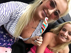 Three girls teasing boy wearing VR