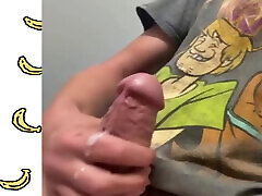 Long Haired Blonde fucks his toy and strokes his cock