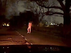 Patiently waiting naked outside for cars to hide from