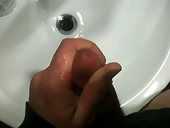 cumshot in public bathroom