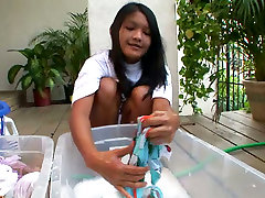 Kat big lov hd is washing her clothes in front of cam outdoor