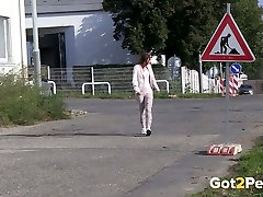 Dirty extreme sexwifeing haired chick pisses near road sign a lot