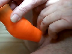Using orange dildo dirty-minded oldie Helene fucks her mature pussy