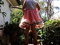 sissy ray outdoors in pink mom scul dress