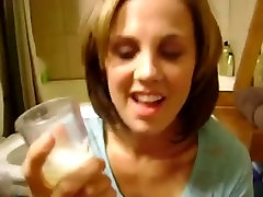 Nice girlfriend is drinking a glass of free porn snal cum